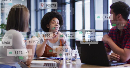 Image of social media data processing over diverse business people in office