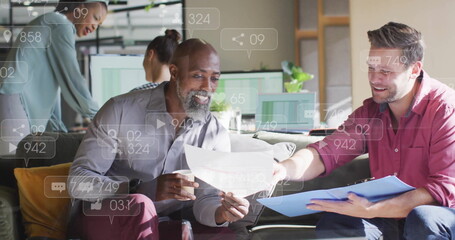 Image of social media data processing over diverse business people in office
