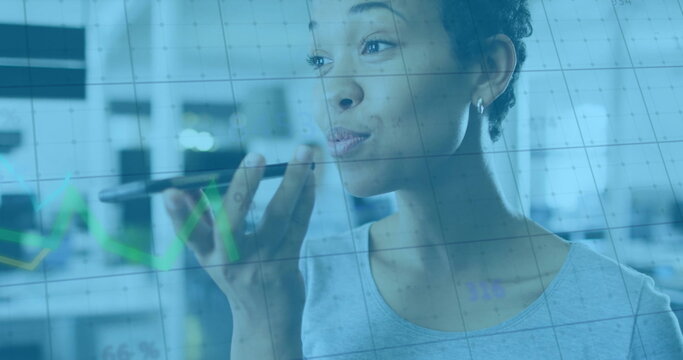 Image of financial data processing over biracial businesswoman using smartphone - Powered by Adobe