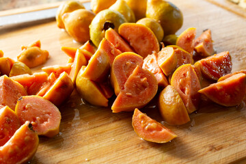 A view of small yellow guavas.