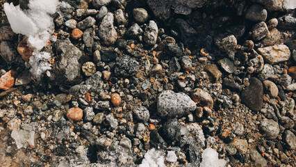 cold mountain waterstream among brown stones