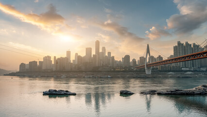 Fototapeta premium Stunning Sunset Over Chongqing's Skyline and River Bridge
