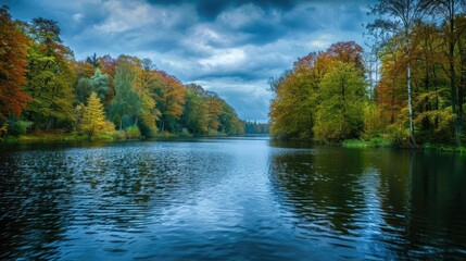 Serene autumn landscape with vibrant foliage reflecting on a tranquil river under a moody sky