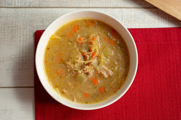 A top down view of a bowl of spaghetti squash soup.