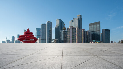 Vibrant Urban Skyline Featuring Modern Architecture and Iconic Red Structure