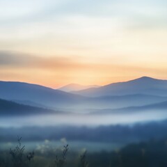 Obraz premium Misty Sunrise Over Blue and Purple Mountain Range