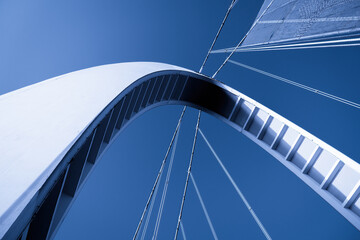Modern Architectural Bridge Against Clear Blue Sky