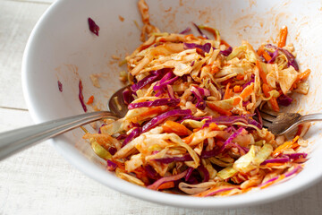 A view of mixing bowl of BBQ coleslaw.