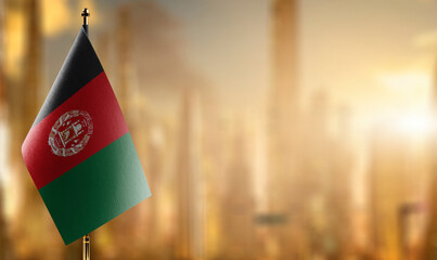 A small Afghanistan flag on an abstract blurry background