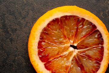 A top down view of a blood orange slice.