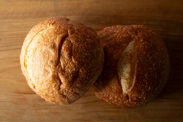 A top down view of some sourdough boule loaves.
