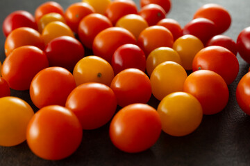 A view of a layer of teeny tiny tomatoes.
