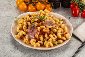 Italian pasta cellentani with anchovy