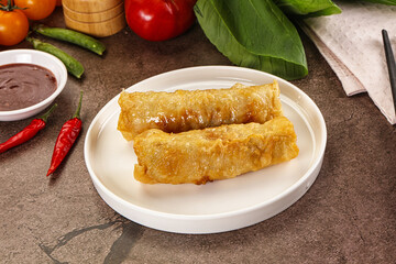 Vietnamese stuffed spring roll served sauce