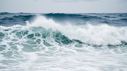 Fototapeta premium Dynamic ocean swells creating frothy whitecaps against a blue horizon