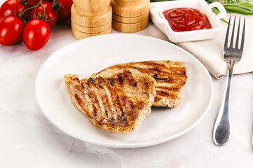 Grilled pork steak with sauce