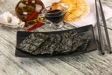 Green nori seaweed chips with soya sauce