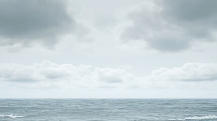 Calm ocean under grey skies, coastal scene, moody weather