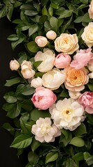 Elegant Lush floral wall featuring roses peonies and greenery creating a stunning photo backdrop for a summer wedding romantic vibe 
