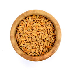 roasted sunflower seeds isolated on white background. Roasted Salted Sunflower Seeds in a bowl.