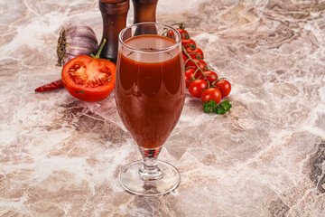 Fresh tomato juice in the glass