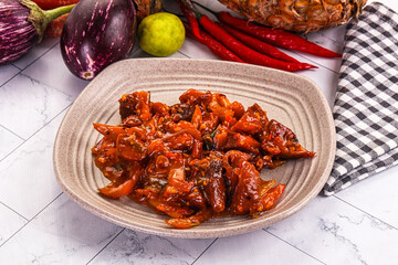 Asian cuisine - pork in chili sauce
