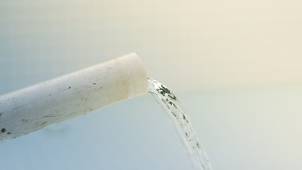 Industrial Water Supply Concept – Flowing Water from Pipe