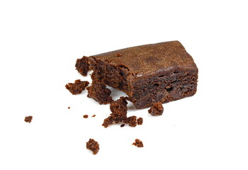 Pieces of fresh brownie on white background. Delicious chocolate pie