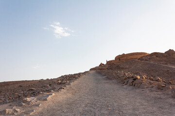 The dirt path upward the summit of the Zoroastrian's towers of silence in Yazd, Iran. 