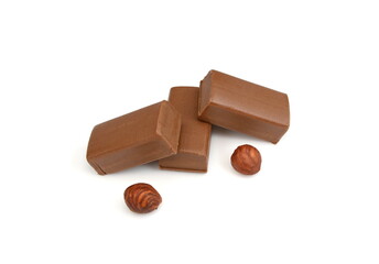 Pure hazelnut nougat bar isolated. Chocolate sweet with nougat isolated on white background.