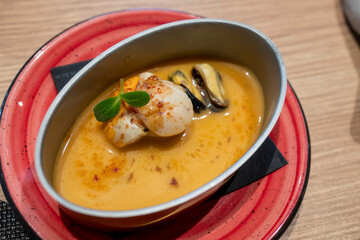 Scallop  and mussels in shrimp sauce gourmet dish Valencia Spain