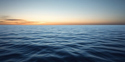 Obraz premium Serene sea view at dawn with gentle waves, background sky. Suitable for travel themes