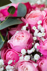 Bouquet of pink shrub roses as a background, flower arrangement