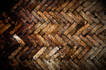Rustic Brick Pavement in Herringbone Pattern.