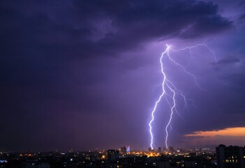 strong thunderstorm with lightning over the city