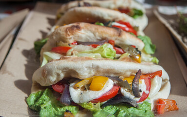 Calzone ortolano displayed at trattoria shop window