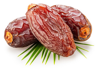 Semi-dried dates or date palm fruits lie on palm leaves isolated on white background. File contains...
