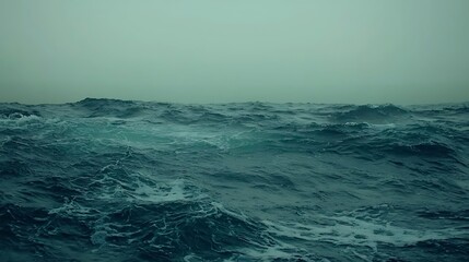 Fototapeta premium The ocean is calm and the sky is grey