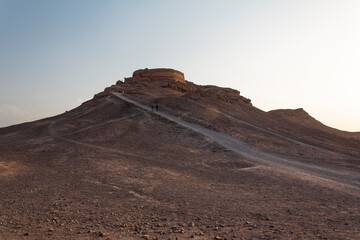 Towers of silence are squat circular walled stone structures, inside which bodies of the deceased of Zoroastrians are exposed to birds who eat the flesh. Yazd, Iran.
