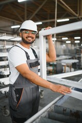 PVC industry worker or operator making frames for windows and doors
