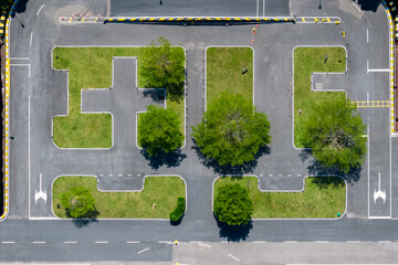 Empty driving school training ground with clear lane markings and obstacles, ready for driving...