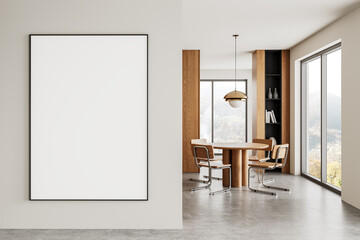 Minimalist dining room with blank framed poster on wall. 3D Rendering
