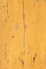 pattern of old grunge wooden wall with peeling color in orange with red background