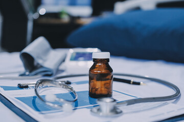 stethoscope on a report stethoscope on a clipboard stethoscope on a book