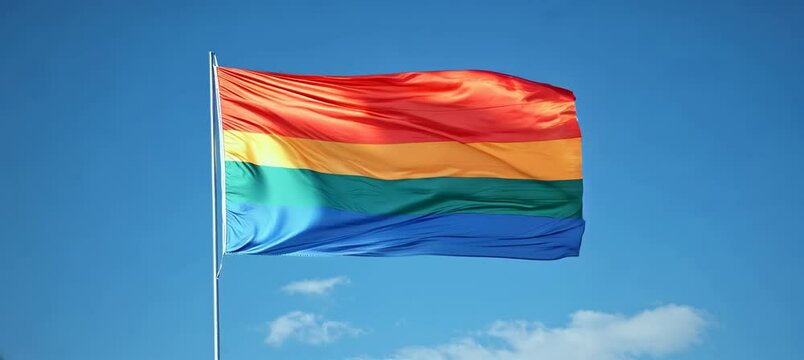 Waving Colorful LGBT pride flag on flagpole. Trans gay lesbian gender equality movement symbol. Generative video AI technology.	

