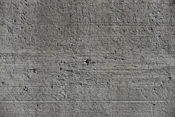 Grunge concrete cement wall with crack in industrial building,
