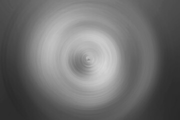 Abstract Swirl: Monochromatic grayscale vortex with concentric circles creating a mesmerizing optical illusion. Perfect for backgrounds, design elements, and abstract art projects. 
