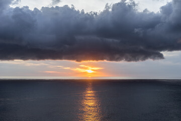 Sunlight Path Reflected In Water On Sunset On Sea Horizon. Dramatic Seascape Background