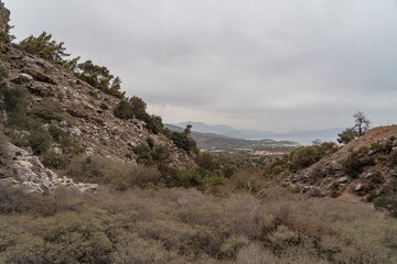 The incredible landscape near the Ha gorge in Crete, Greece. With a nice chapel and views over the hills. 