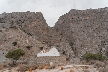 The incredible landscape near the Ha gorge in Crete, Greece. With a nice chapel and views over the hills. 